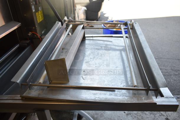 Belshaw 22306W Commercial Thermoglazing Station with casters, 208V, 1 Phase. Stainless steel, good condition.