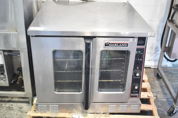Garland Master 200 commercial convection oven with view-through doors, thermostatic controls, and sturdy metal legs.