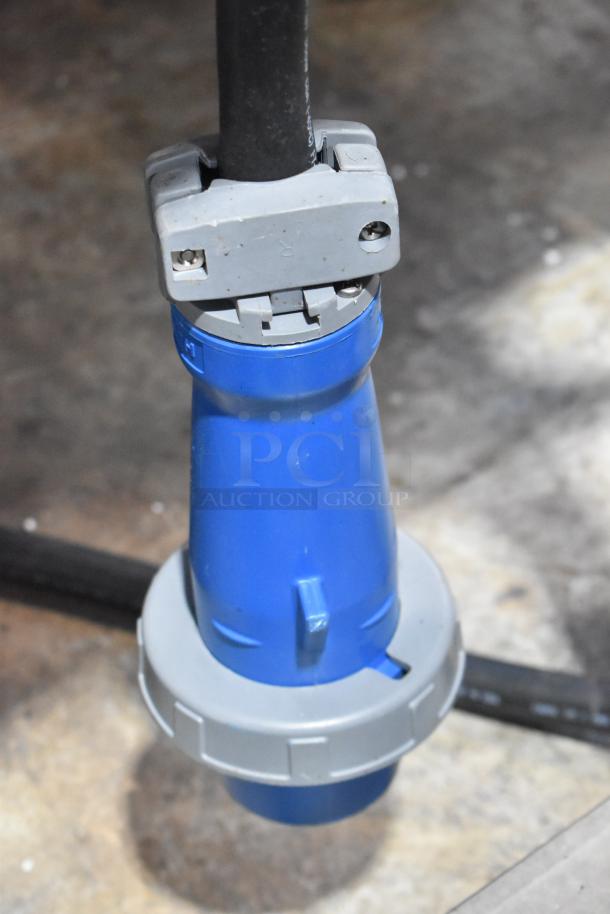 Electrical connector for Belshaw Adamatic TG-50 Thermoglazing Station. Blue and gray design, attached to a black cable.