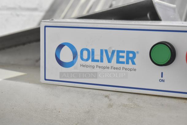 Oliver 797-32NC bread loaf slicer control panel, featuring branding and an "ON" button.