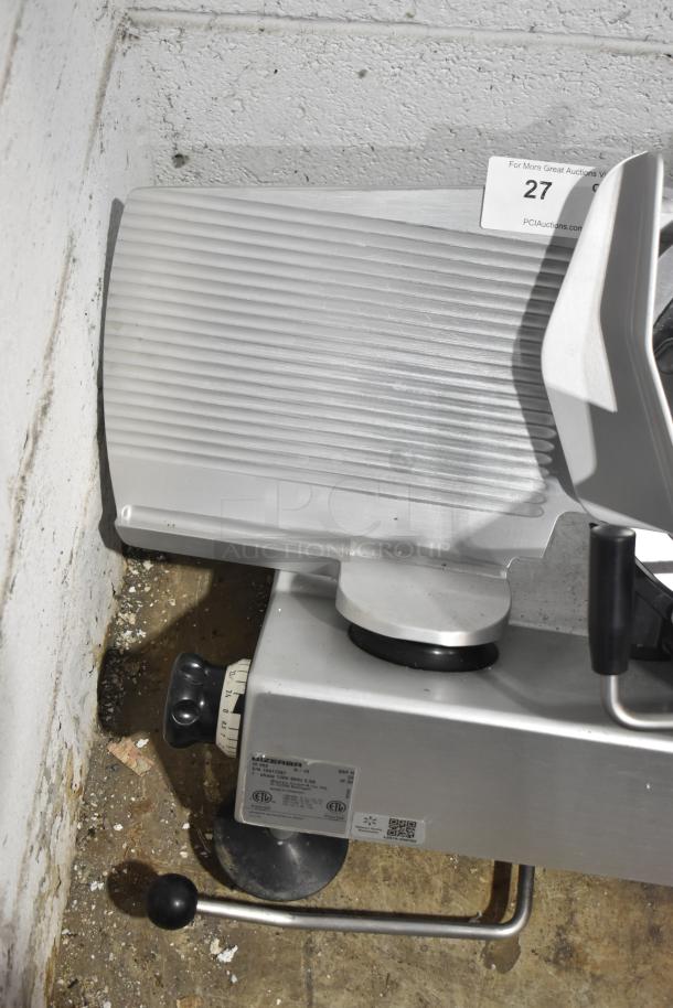 Bizerba GSP H commercial meat slicer, 120V, 1 phase, in used condition. Features control knobs and visible brand label.