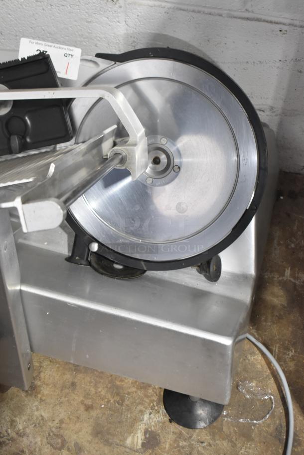 Bizerba GSP H commercial meat slicer, countertop model. Features stainless steel blade, 120V, 1 phase. Good condition.