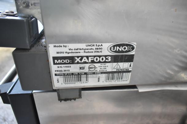 Cadco Unox XAF003 countertop electric convection oven, 120V, metal construction, clear model label and specifications.