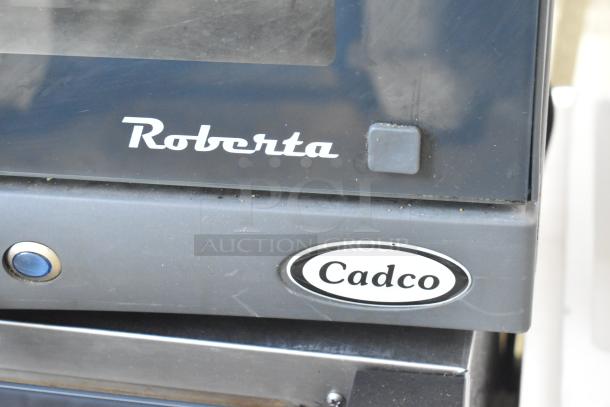 Cadco Unox XAF003 Roberta convection oven with branding visible, 120V, electric-powered, used condition.