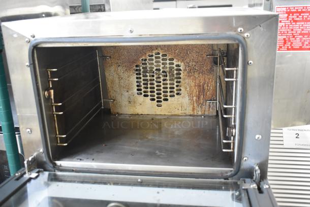 Cadco Unox XAF003 Roberta electric convection oven, commercial countertop model, interior view, 120V, used condition.