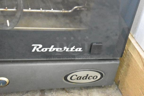 2016 Cadco Unox XAF003 Roberta convection oven, 120V, 1 phase, black metal finish, with brand and model markings.
