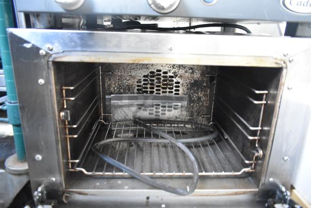 2016 Cadco Unox XAF003 Roberta Convection Oven, metal finish, countertop, 120V, commercial use, interior view shown.