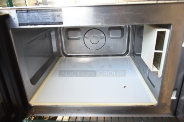 2021 Sharp R-21LVF Commercial Microwave Oven, 120 Volts, 1 Phase, interior view, stainless steel, used condition.