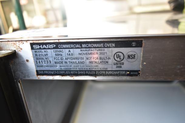 2021 Sharp R-21LVF Commercial Microwave Oven, 120V, 1 Phase, metal tag shows specifications and serial number 141239.