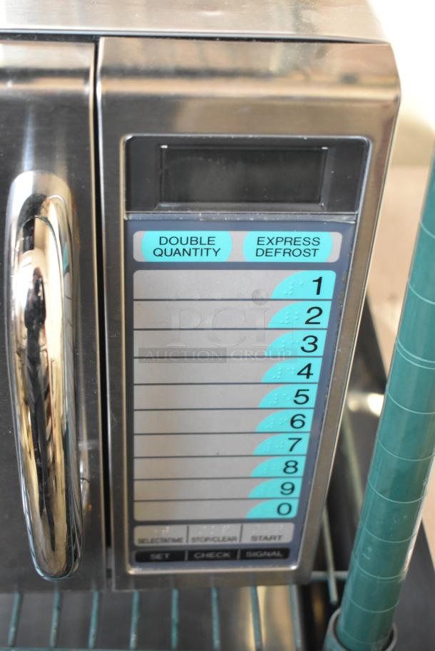 2021 Sharp R-21LVF Commercial Microwave Oven, 120V, 1 Phase, stainless steel with keypad for double quantity and express defrost.