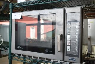 Amana RCS10MPA commercial microwave oven, 120 volts, with control panel, stainless steel finish, used condition.