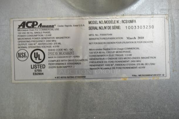 Amana RCS10MPA Commercial Microwave label showing model, serial number, voltage, and compliance details.