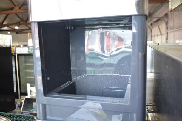 General Electric GE OPAL01GEW1KT Nugget Style Ice Maker, 120V, 1 Phase, in clean condition, open ice compartment visible.