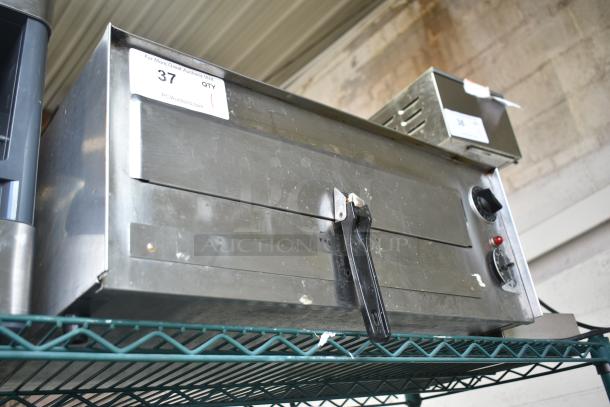 Wisco 560 countertop electric pizza oven, 120V, 1 phase, stainless steel, with control knobs, tag marked "37 QTY 1".