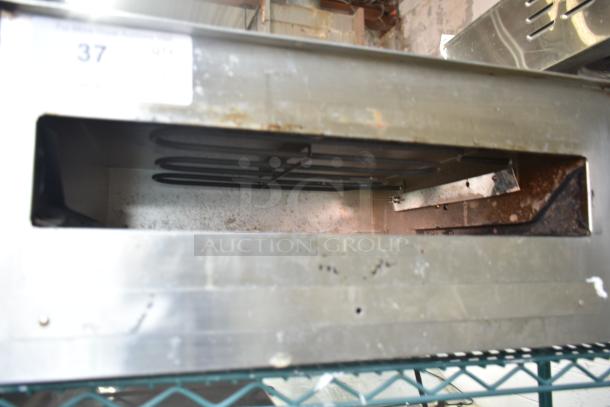 Wisco 560 countertop electric pizza oven, 120 volts, 1 phase, visible interior heating elements, signs of wear.