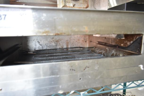 Wisco 560 Countertop Electric Pizza Oven, 120V, 1 Phase, visible wear, interior heating element, used condition.