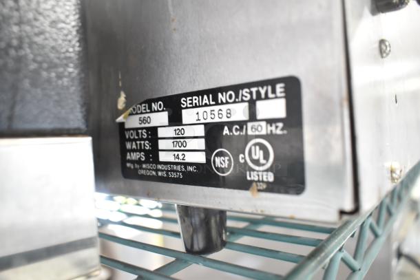 Wisco 560 countertop pizza oven, electric, 120V, 1 phase. Label shows model, serial number, NSF, and UL certification.