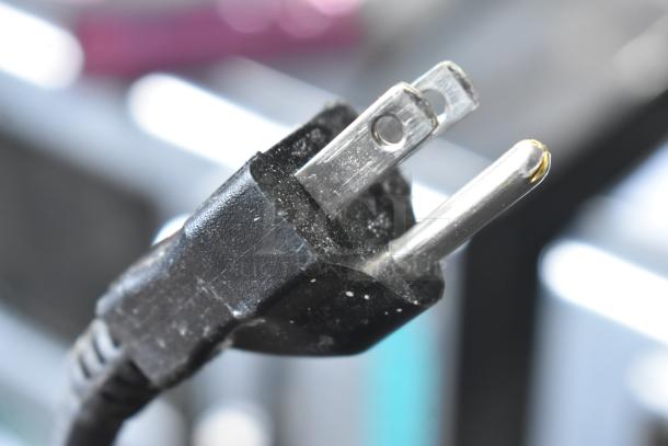 Close-up image of a power cord plug, compatible with the 2021 Bunn VPR Coffee Machine, 120 Volts, 1 Phase.