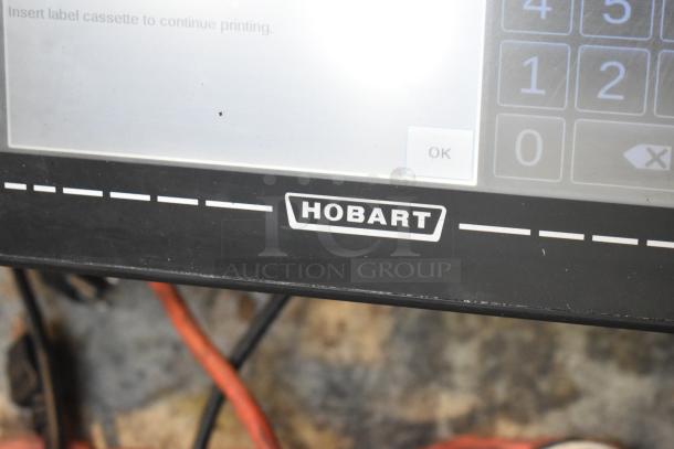 2016 Hobart HTi-7LH commercial scale, digital display, visible Hobart logo; 120/208-240V, tested working condition.