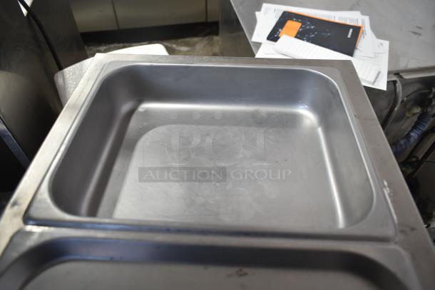 2019 Nemco 6055A countertop food warmer, stainless steel, good condition. 120 volts, 1 phase. Visible signs of use.