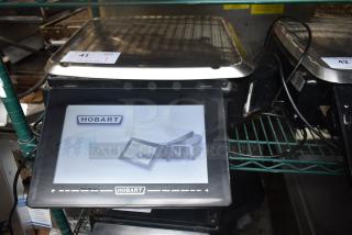 2017 Hobart HTi-7LH26 food portioning scale, stainless steel, tested, 120/208-240V, 1 phase, excellent condition, Hobart logo visible.