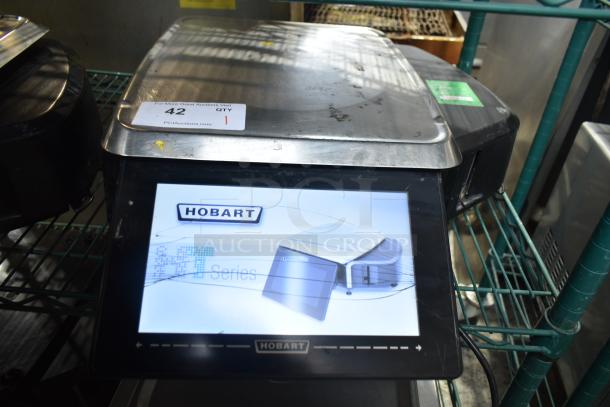 2018 Hobart HTi-7LH3 commercial food portioning scale, touchscreen shows damage. Tested and working. 120/208-240V, 1 Phase.