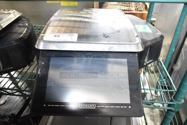 2018 Hobart HTi-7LH3 commercial countertop scale. Touchscreen shows damage. Model HTi-7LH3, 120/208-240V, 1 phase. Tested working.