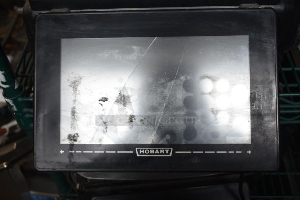 2016 Hobart HTi-7LH food portioning scale with cracked screen, no power cord, not powering on.