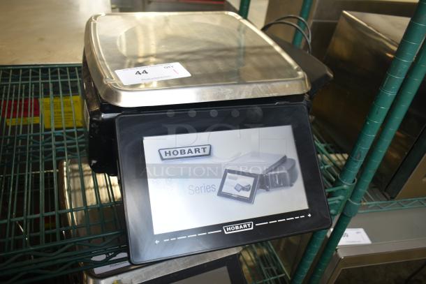 2016 Hobart HTi-7LH commercial food portioning scale, tested and working, 120/208-240V, 1 phase, in good condition.