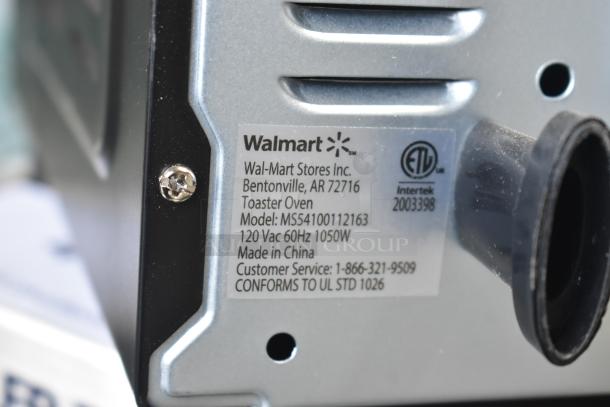 Mainstays MS54100112163 toaster oven label, 120 volts, 1 phase. Shows model, voltage, and UL compliance details.