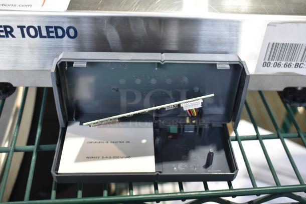 Mettler Toledo BC Countertop Scale, stainless steel, visible wiring and barcode label, model BC, good condition.
