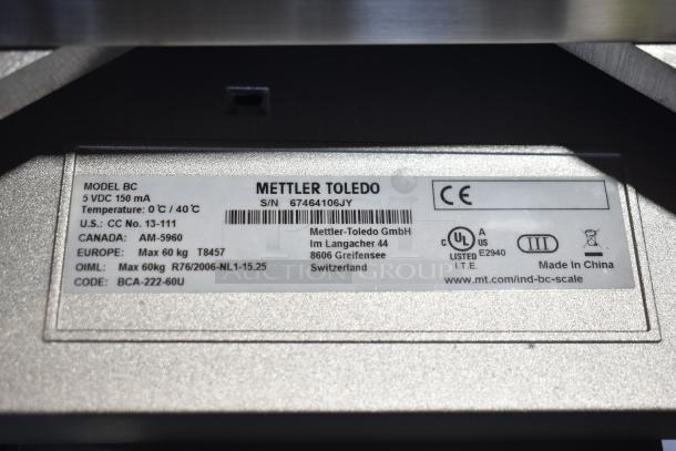 Mettler Toledo BC Countertop Scale label with model, serial number, voltage, temperature range, and certifications.