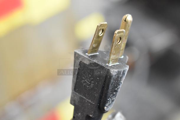 A close-up of the 120-volt plug for the 2020 Bizerba GSP H Commercial Countertop Meat Slicer.