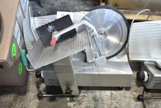 2017 Bizerba GSP H commercial meat slicer, 120V, 1 phase, clean condition, features adjustable blade, safety guard, model markings visible.