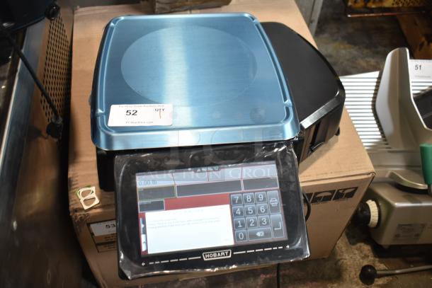 2025 Hobart HTi-7LH4W food portioning scale, excellent condition, clear digital display, 120/208-240V, 1 Phase.