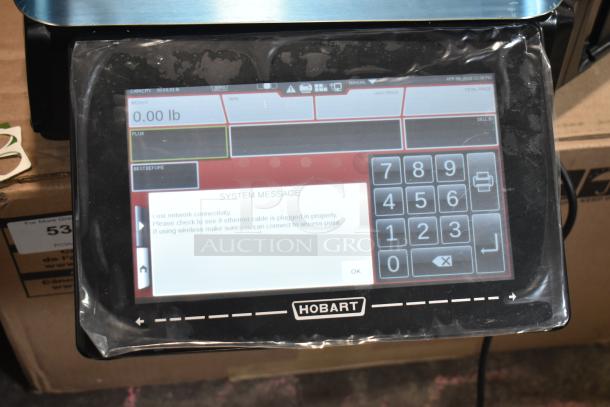 Hobart HTi-7LH4W commercial countertop food portioning scale, digital display, 120/208-240V, 1 Phase, new condition.