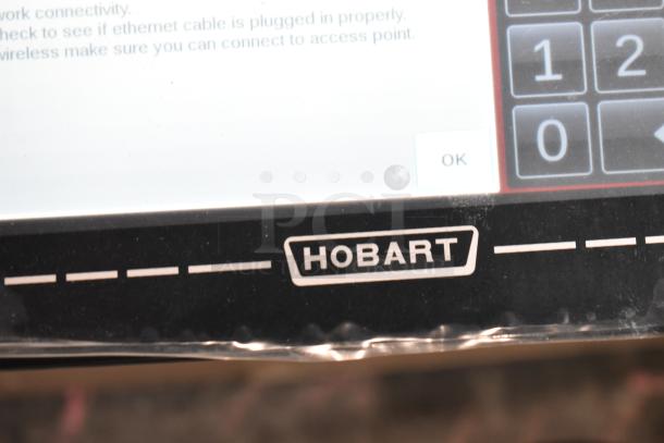 2025 Hobart HTi-7LH4W scale, visible branding, touchscreen, 120/208-240V, 1-phase, for commercial food portioning.