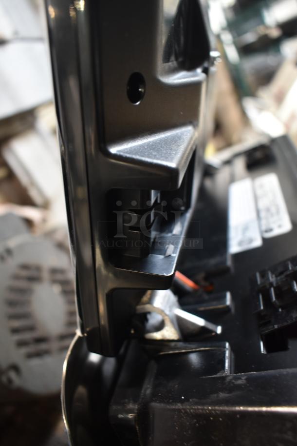 2025 Hobart HTi-7LH4W countertop food portioning scale, dual voltage, close-up showing side components, in used condition.