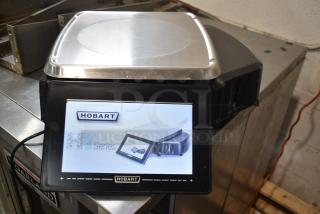 2017 Hobart HTi-7LH26 commercial food portioning scale, stainless platform, touchscreen display, tested and working condition.