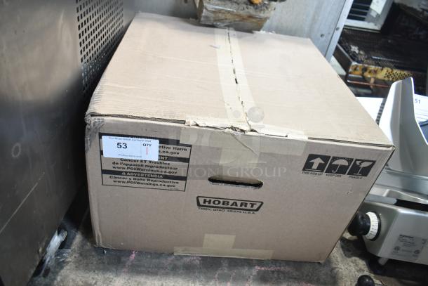 2017 Hobart HTi-7LH26 Food Portioning Scale in box. Tested, working. 120/208-240V, 1 Phase. Box shows labels, logo.