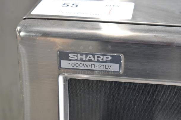 2021 Sharp R-21LVF commercial microwave oven, stainless steel, 1000W, 120V, 1 phase. Model label visible.