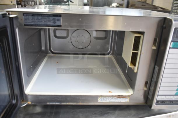 2021 Sharp R-21LVF commercial microwave, clean interior, stainless steel, 120V, 1 phase, visible control panel.