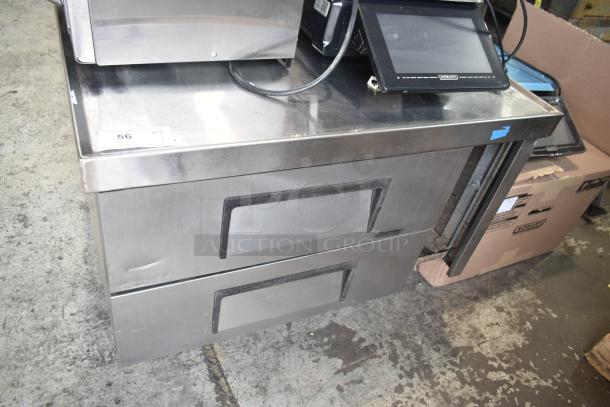 True TRCB-36 commercial chef base with 2 drawers on casters, 115V, 1 phase. Stainless steel surface, good condition.