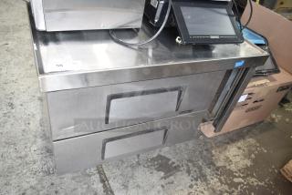 True TRCB-36 commercial chef base with 2 drawers on casters, 115V, 1 phase. Stainless steel surface, good condition.