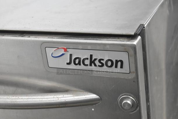 Jackson Avenger Undercounter Dishwasher, stainless steel, visible Jackson logo, sturdy handle, slightly used condition.