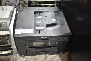 Epson WorkForce WF-7840 printer, scanner, copier in good condition. Features include control panel and document feeder.