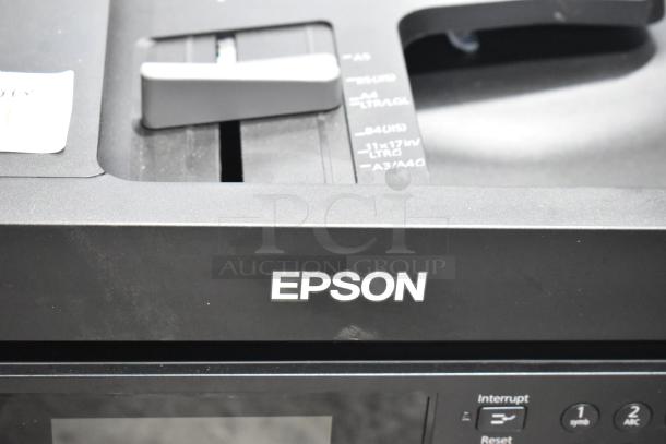 Epson WorkForce WF-7840 multi-function printer with control panel, featuring scanning and copying capabilities, in good condition.