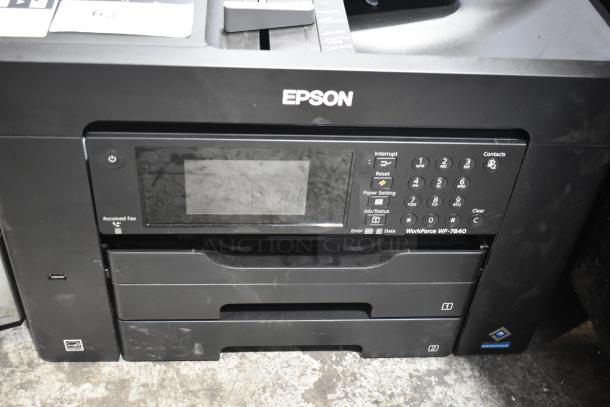 Epson WorkForce WF-7840 printer with control panel, dual paper trays, and visible logo, in good condition.