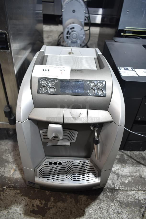 LavAzza countertop espresso machine with steam wand, 115 volts, 1 phase. Features control panel, used condition.
