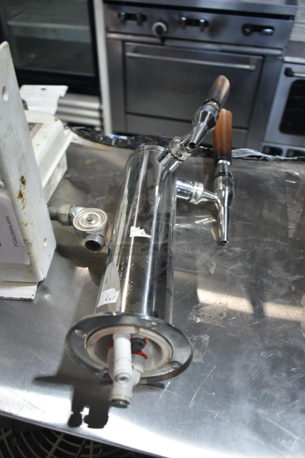 4-item lot including stainless steel beer tower, Ecolab dispenser, fire suppression box, metal piece. Varied conditions.